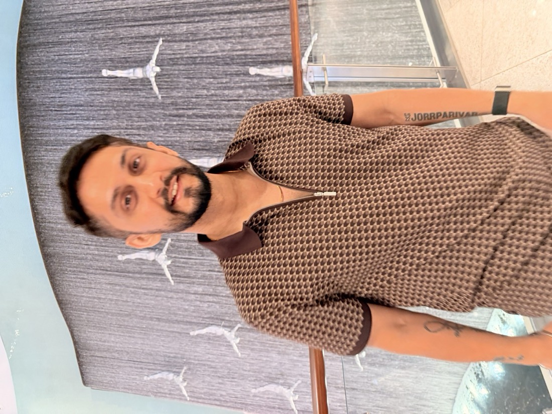 Digital Pratik smiling, the JorrParivar tattoo on his forearm